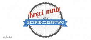 Zdjęcie kolorowe przedstawiające logo akcji &quot;Kręci mnie bezpieczeństwo&quot;